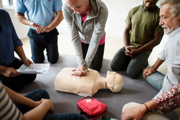 Students practicing CPR in a first aid class